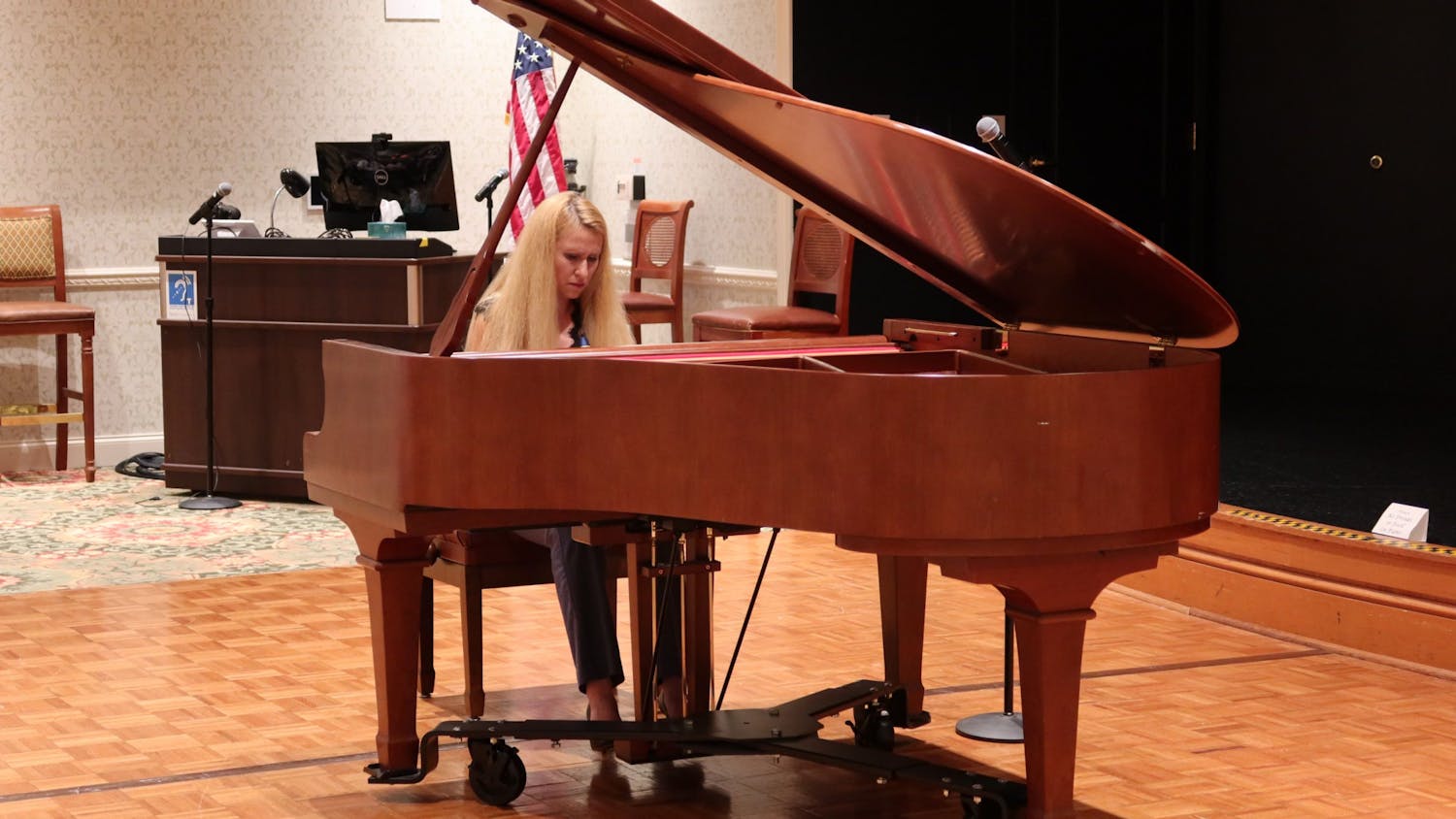 Anastasiya Naplekova plays the piano for Oak Hammock residents to raise money for Ukrainian musicians, Wednesday, July 20, 2022.