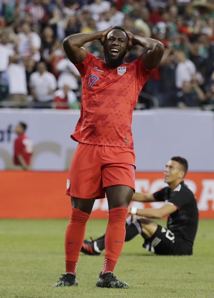 United States forward Jozy Altidore reacts after missing a shot against Mexico during the first half of the CONCACAF Gold Cup final soccer match at Soldier Field in Chicago, Sunday, July 7, 2019. 