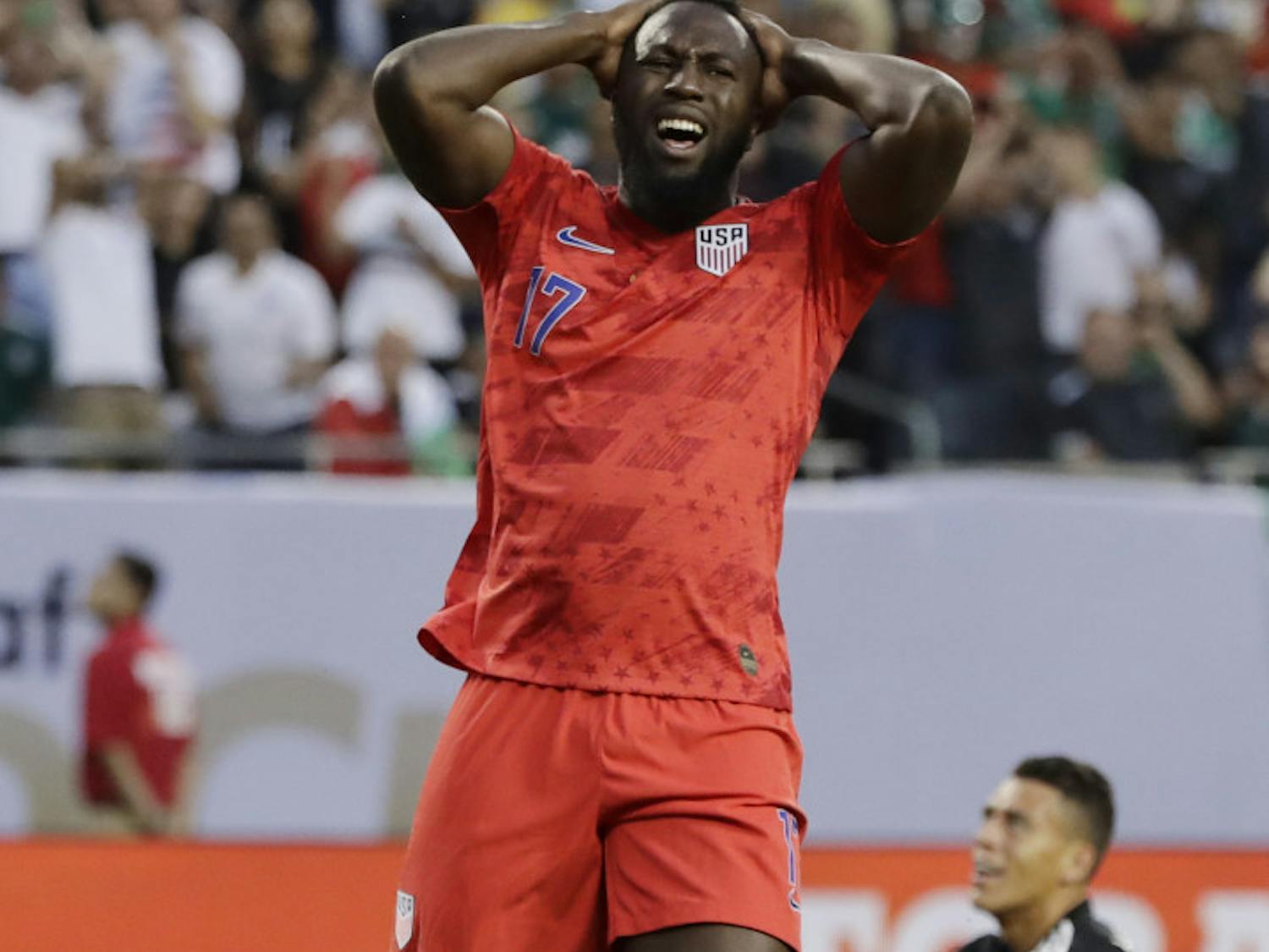 United States forward Jozy Altidore reacts after missing a shot against Mexico during the first half of the CONCACAF Gold Cup final soccer match at Soldier Field in Chicago, Sunday, July 7, 2019. 