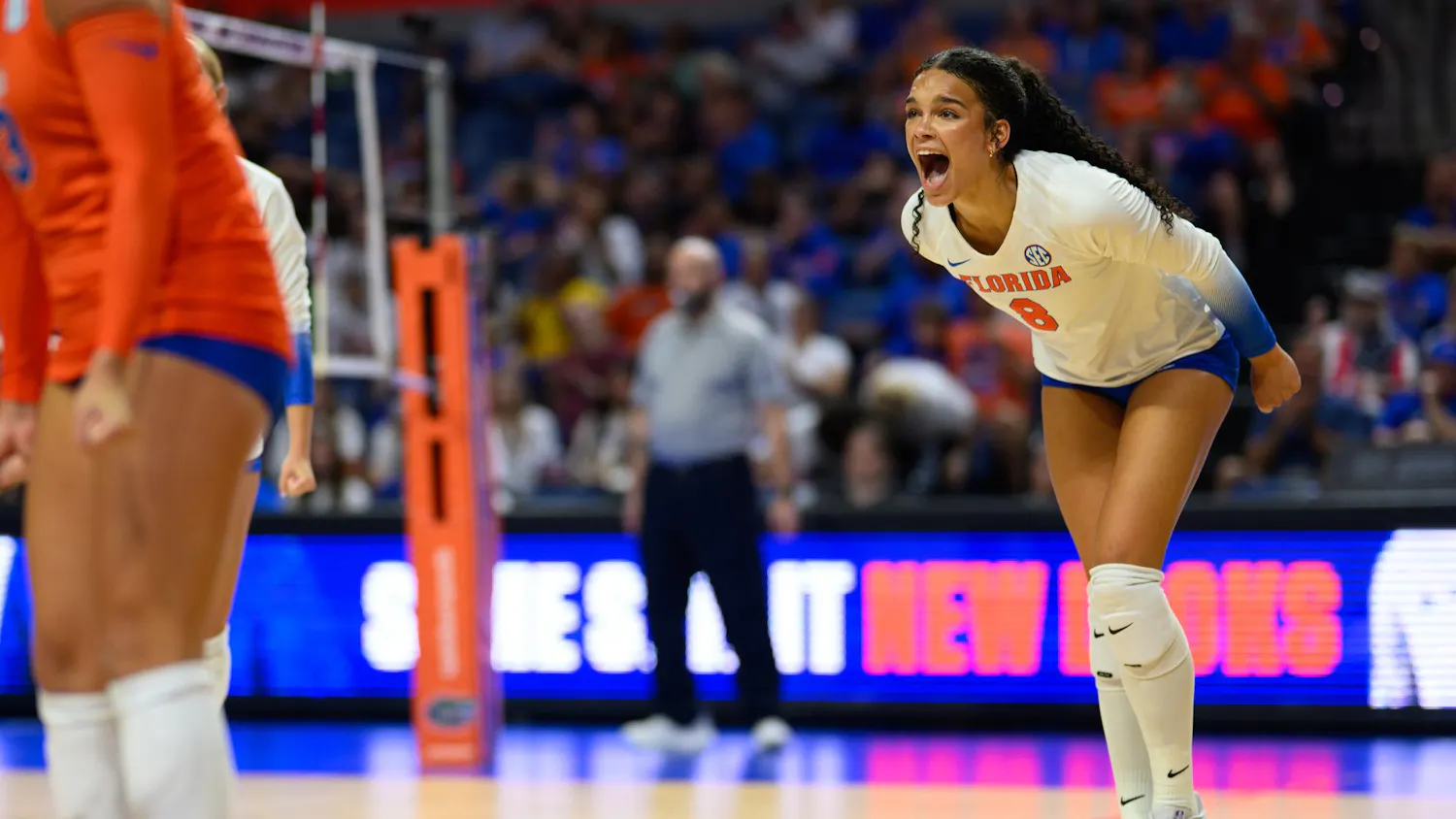 Florida opposite Logan King (8) celebrates winning a point during an NCAA Volleyball match against FAU, Friday, Sept. 11, 2026, in Gainesville, Fla.