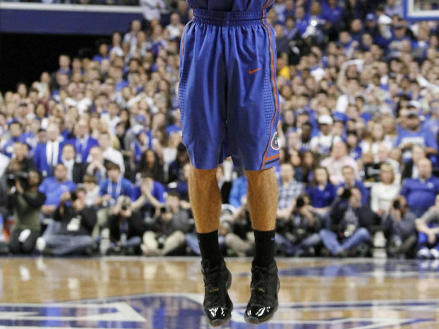 Scottie Wilbekin shoots an uncontested three-point shot during Florida’s 69-59 win against Kentucky on Saturday in Lexington, Ky. Wilbekin scored a career-high 23 points in the win, which was the Gators’ first in Rupp Arena since 2007.