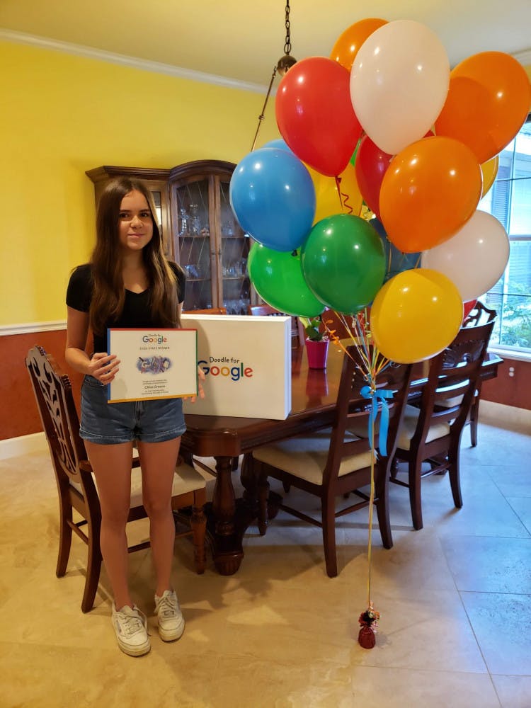 Fifteen-year-old Chloe Greene, Florida’s Doodle for Google finalist, was celebrated with two Google prizes and balloons Aug. 15.