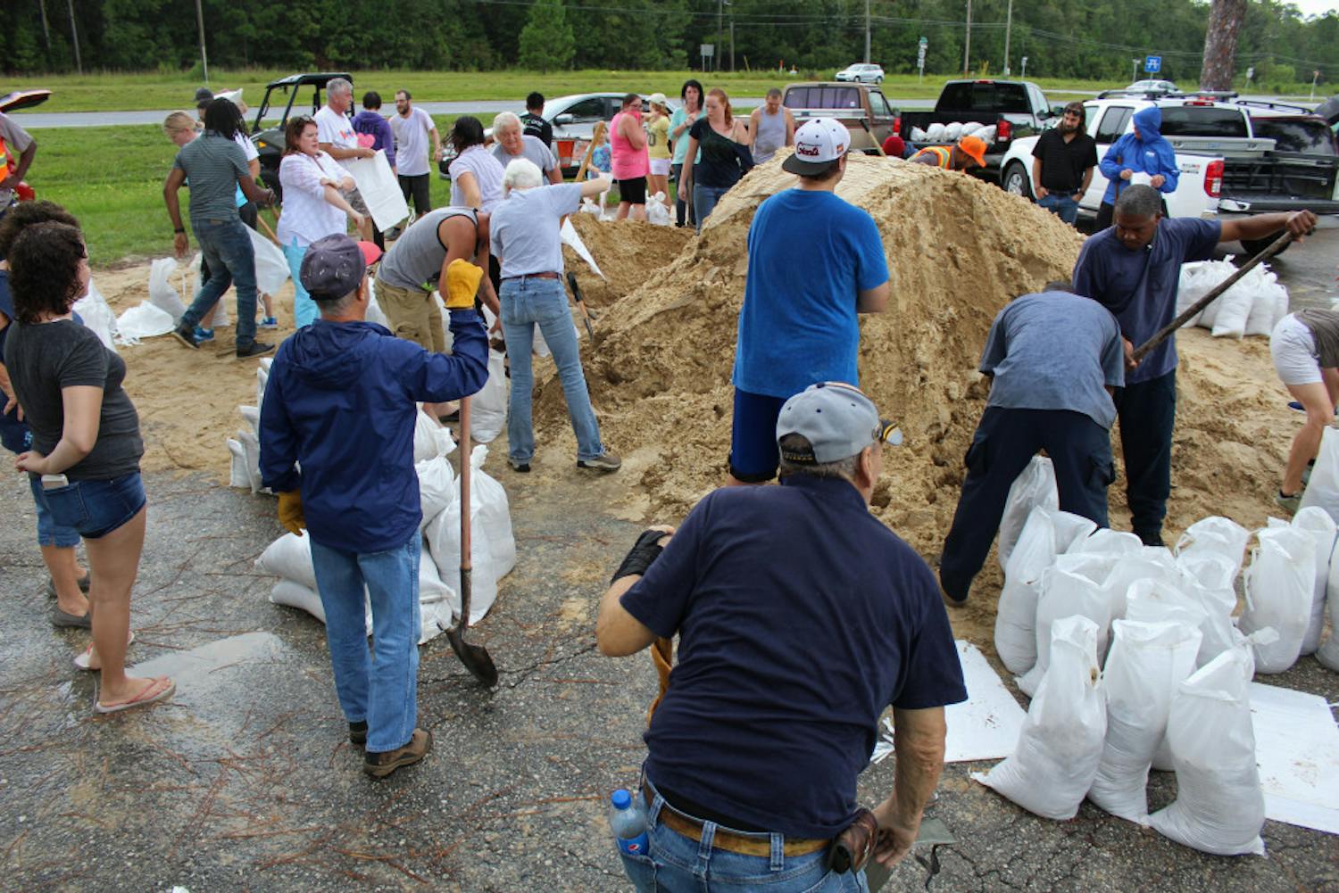 Alachua County residents work to fill sandbags to prepare for Hurricane Irma. Irma is currently ranked as a Category 5 hurricane and projections see it heading toward Florida. 
