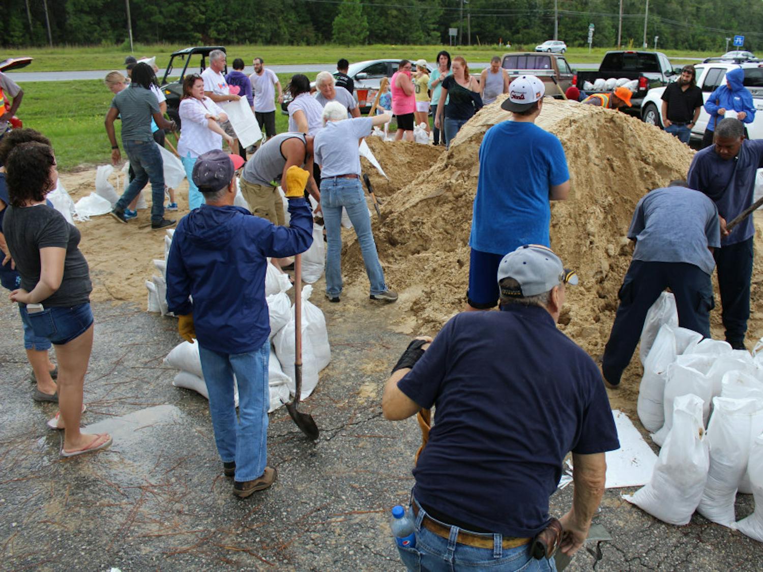 Alachua County residents work to fill sandbags to prepare for Hurricane Irma. Irma is currently ranked as a Category 5 hurricane and projections see it heading toward Florida.