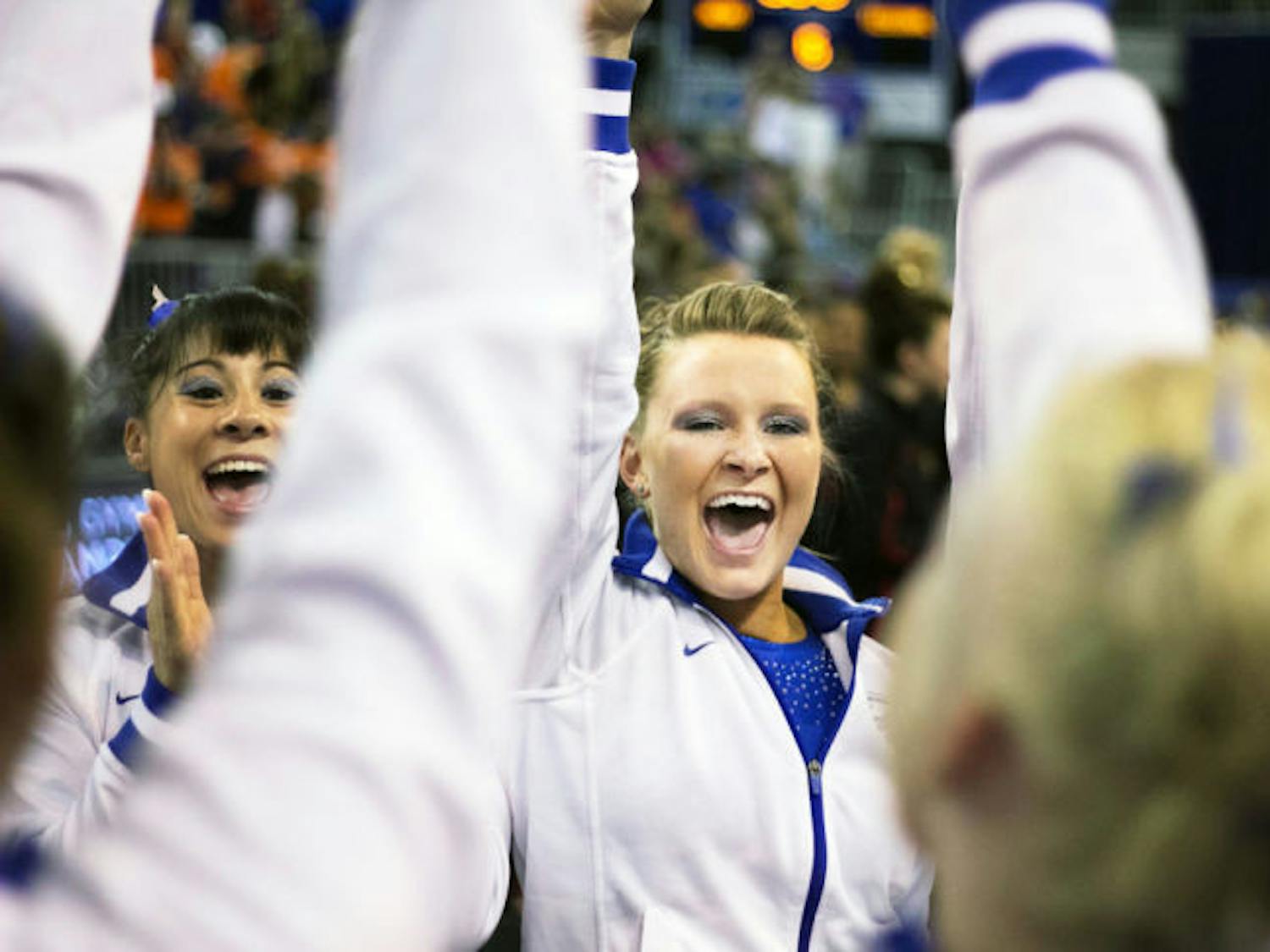 Bridget Sloan celebrates during the NCAA Regionals on April 6 in the O’Connell Center. Florida won the meet with a score of 198.4. Sloan posted a 9.925 on uneven bars at the NCAA Championships Friday. 
