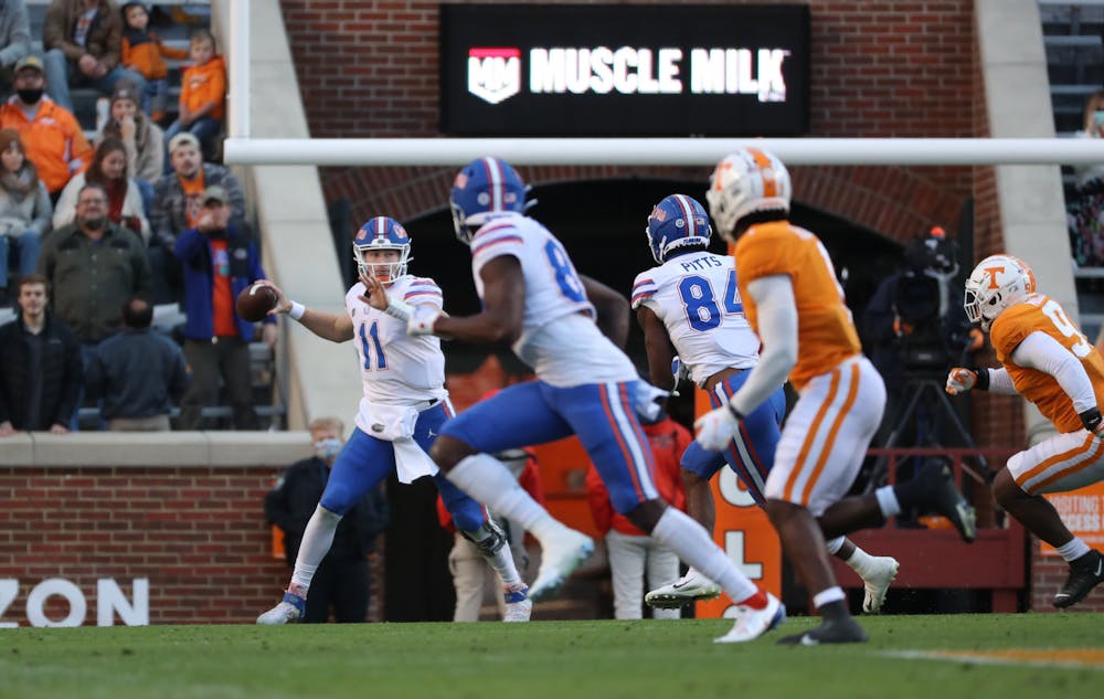 Kyle Trask (11) winds up, preparing to pass the football at the Gators' game against the Volunteers at Neyland Stadium in Knoxville, Tennessee, on Dec. 5, 2020.
