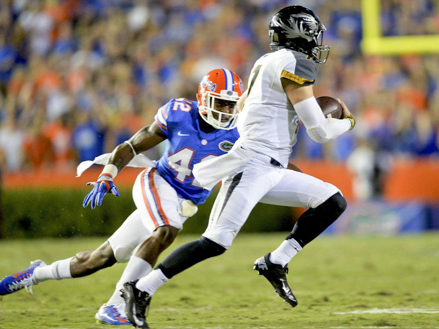 Sophomore defensive back Keanu Neal makes a run at Missouri quarterback Maty Mauk during Florida's 42-13 loss to Missouri on Saturday at Ben Hill Griffin Stadium.