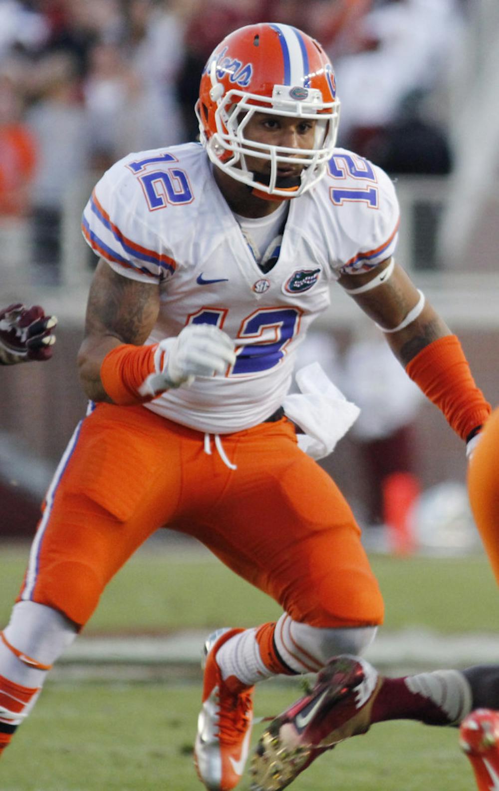 <p align="justify">Antonio Morrison chases down a Florida State player during Florida’s 37-26 win on Nov. 24, 2012 in Doak Campbell Stadium.</p>