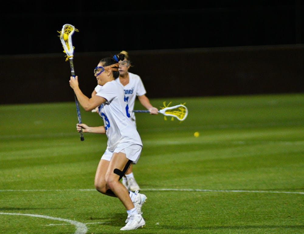 UF midfielder Madi Hall scored four goals in Florida’s 22-11 win over Brown on Tuesday at Donald R. Dizney Stadium.