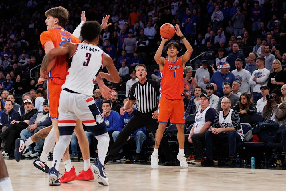 <p>Florida Gators guard Xaivian Lee still hasn't found his shot from 3, landing 1 of 7 attempts against No. 5 UConn at Madison Square Garden.</p>
