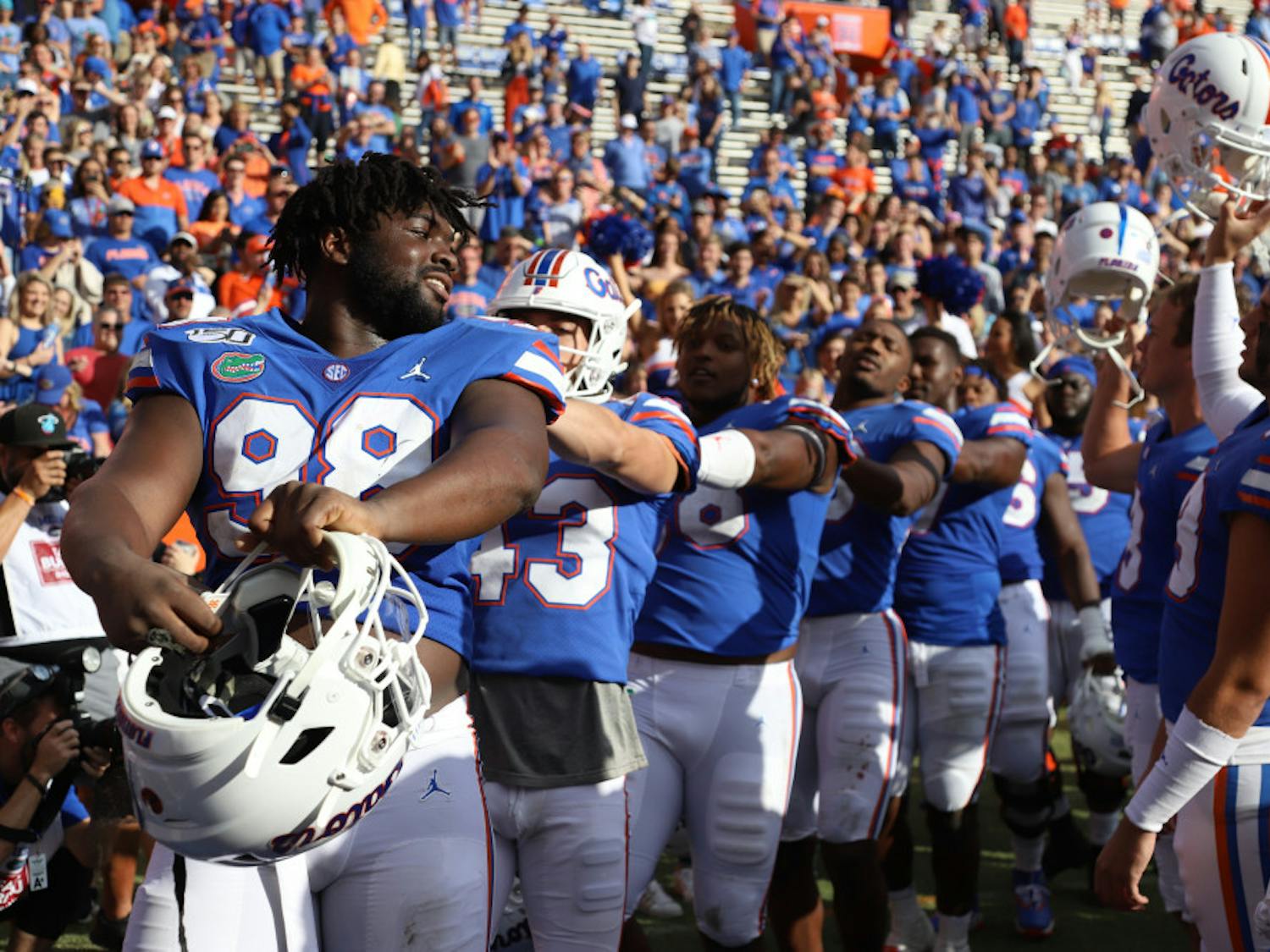 The Gators celebrating a home win against Vanderbilt last season. In Saturday's opening kickoff, the Gators and Rebels displayed their support of the Black Lives Matter movement.