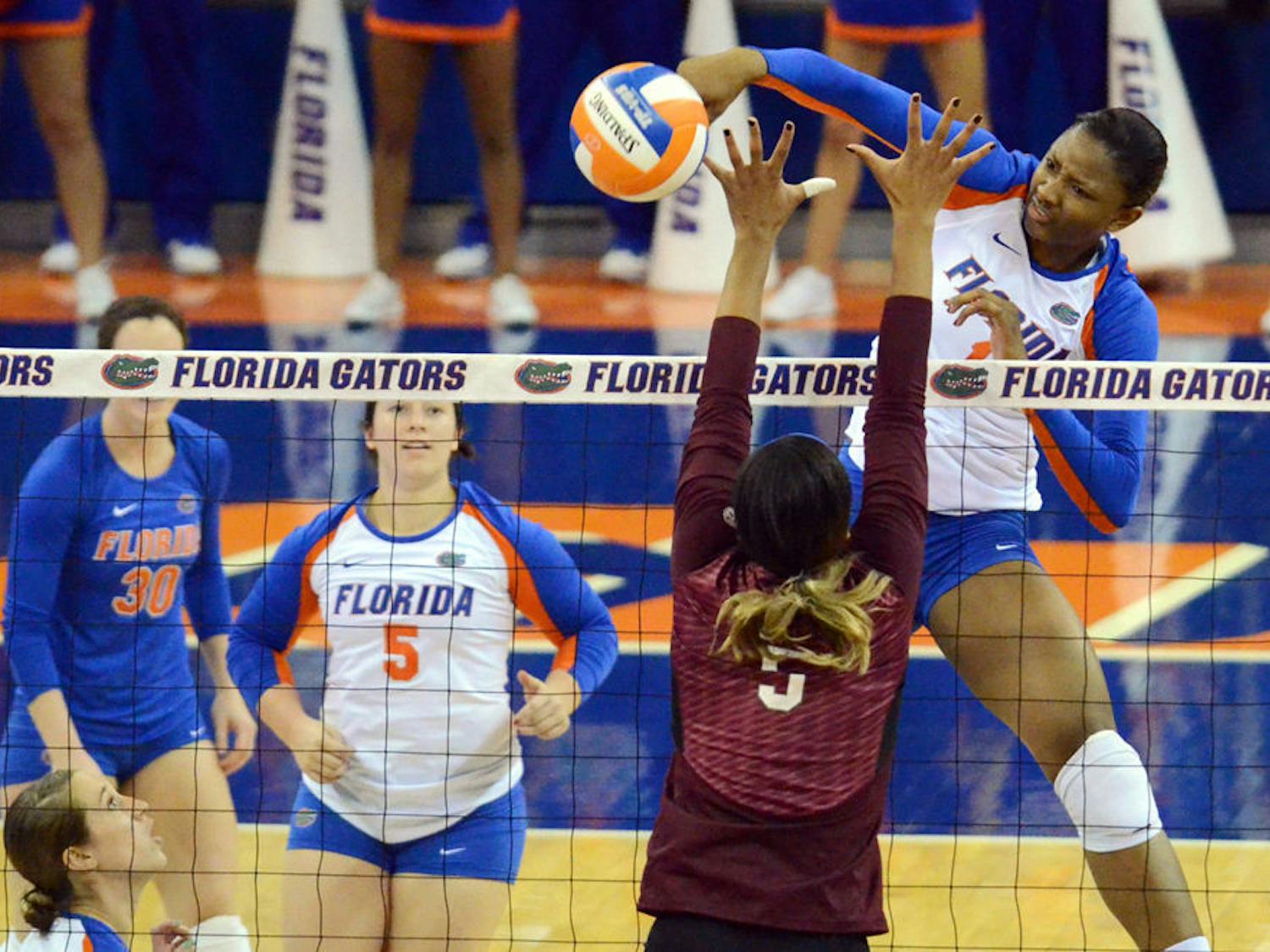 Rhamat Alhassan swings for a kill attempt during Florida's 3-0 win against Mississippi State.