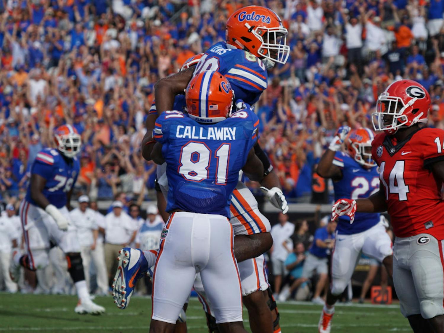Antonio Callaway celebrates with C'yontai Lewis during UF's 24-10 win over Georgia on Oct. 29 at EverBank Field.