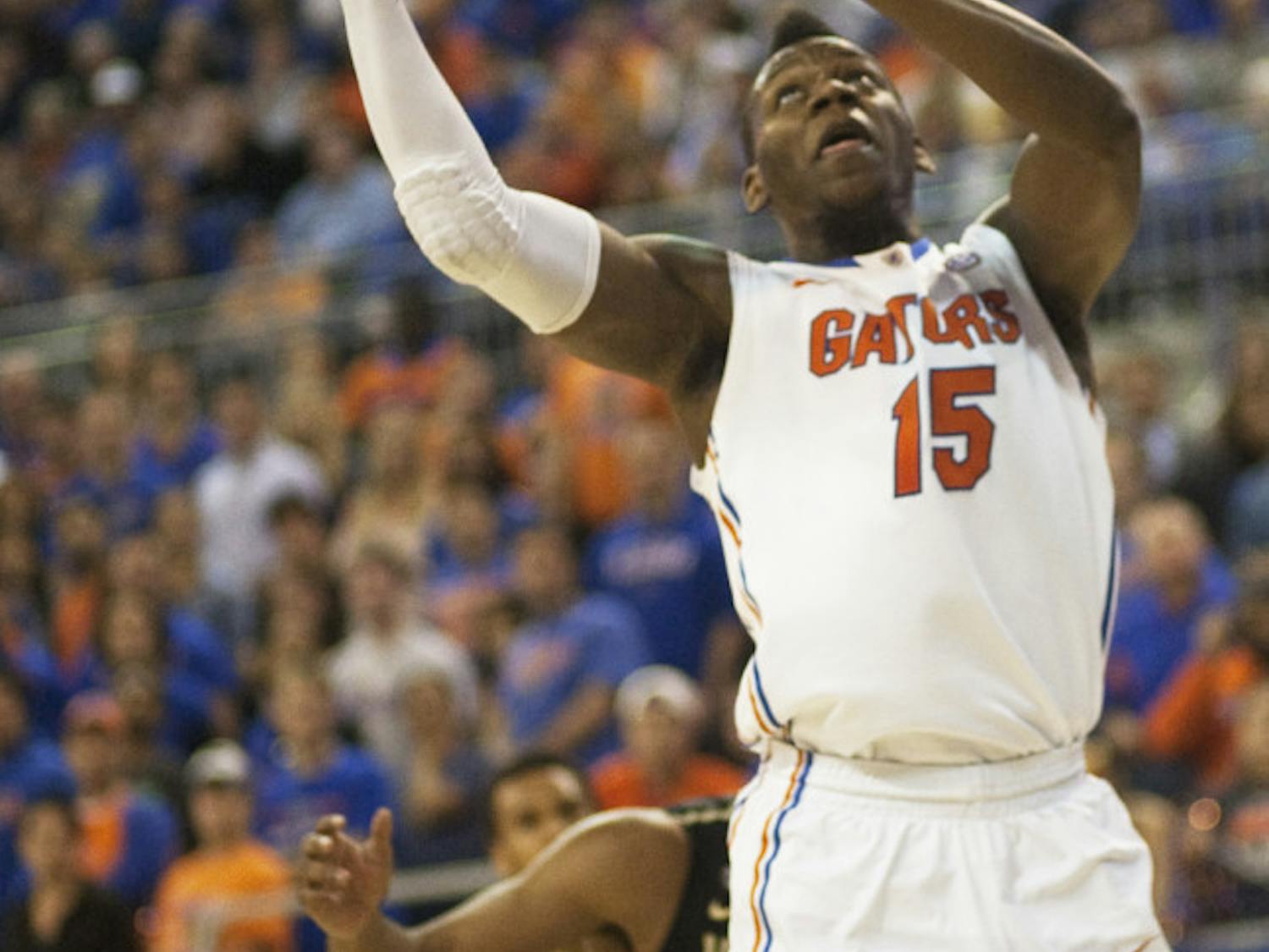 Junior forward Will Yeguete attempts a layup during Florida’s 66-40 victory against Vanderbilt on March 6 in the O’Connell Center. Yeguete underwent arthroscopic debridement on his right knee Wednesday. 