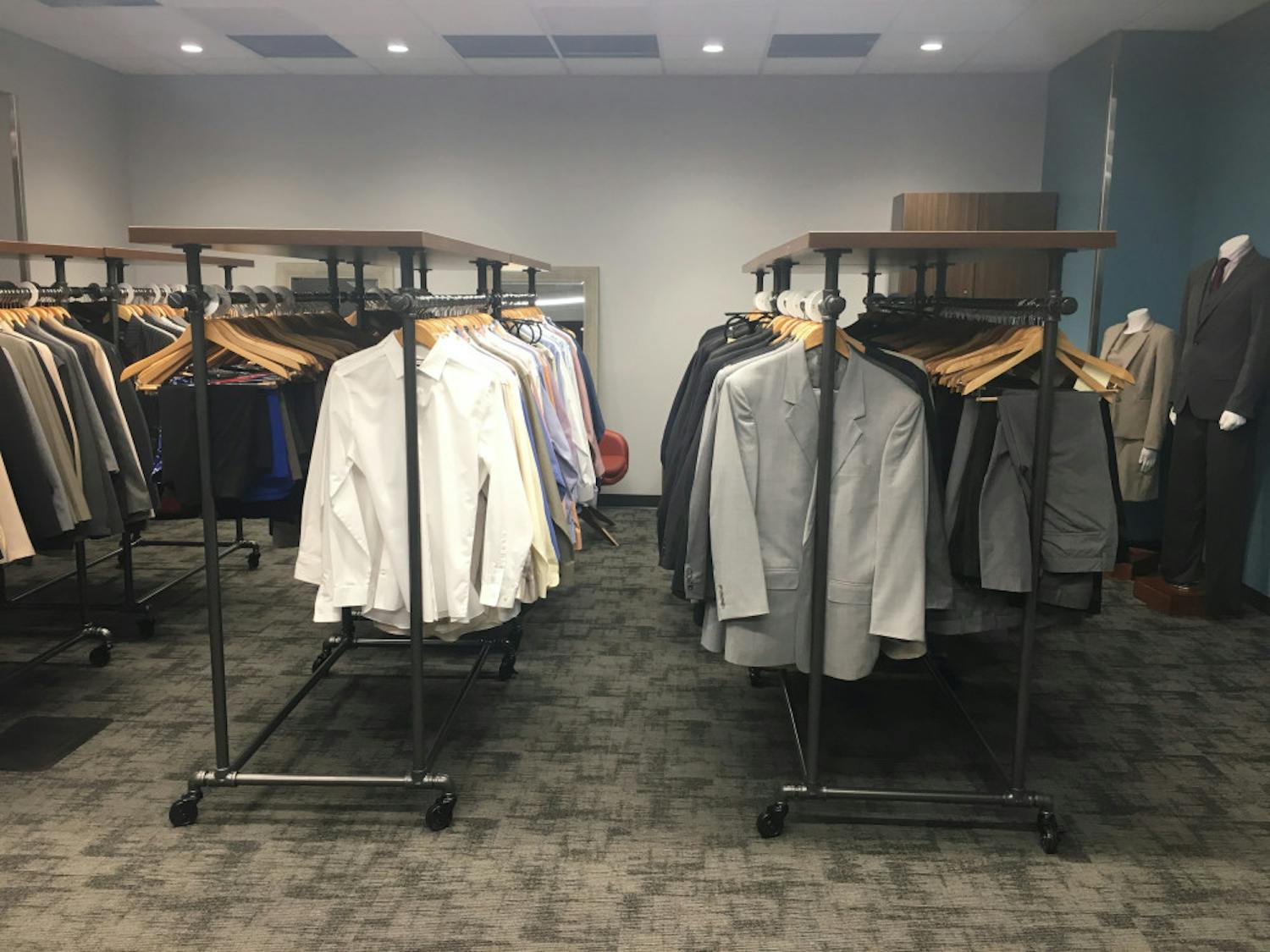 Career Connections Center staff are renovating the new space for the Gator Career Closet. The new space will have a larger selection of business attire for students.