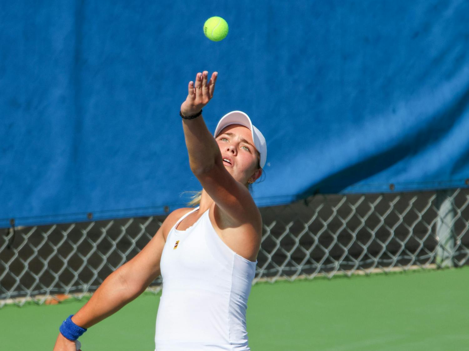 Florida freshman Rachel Gailis serves the ball during the Gators' 4-1 win against the No. 3 Michigan Wolverines Wednesday, March 22, 2023.