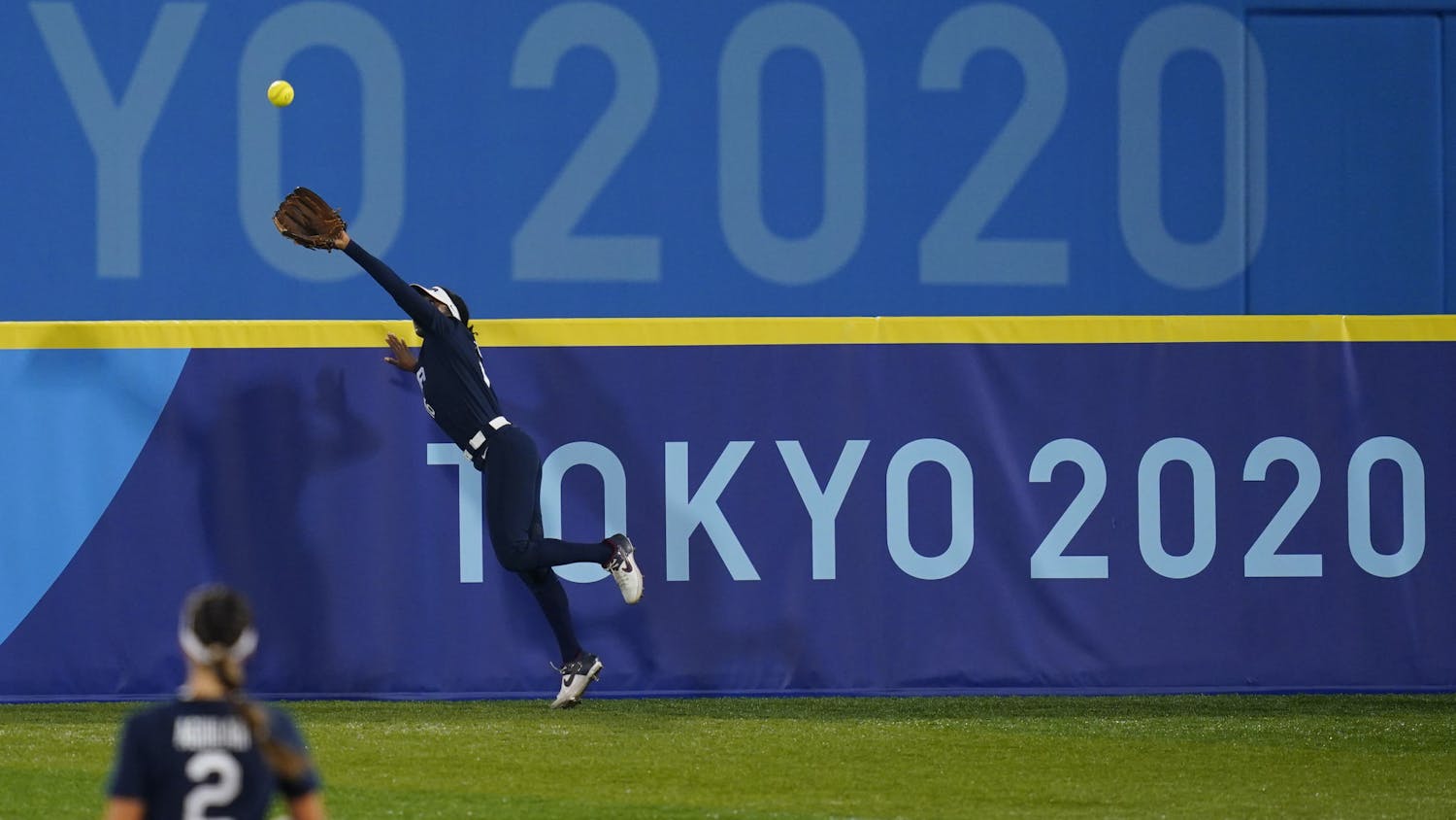 United States' Michelle Moultrie catches a fly out during a softball game against Japan at the 2020 Summer Olympics, Tuesday, July 27, 2021, in Yokohama, Japan. (AP Photo/Matt Slocum)