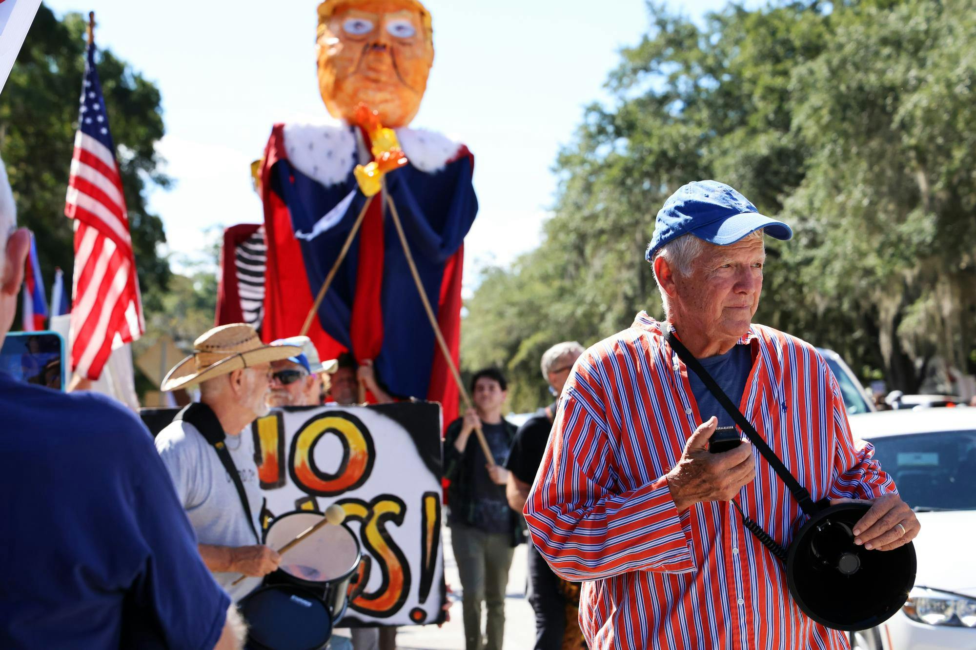 Glenn Terry leads a drum line at a "No Kings" protest on Saturday, Oct. 18, 2025, in Gainesville, Fla.