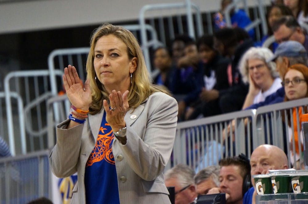 <p>UF coach Amanda Butler claps during Florida's 53-45 win against LSU on Jan. 17, 2016, in the O'Connell Center.</p>