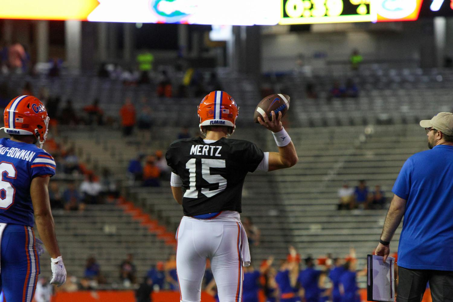 Graham Mertz attempts a pass in the Orange and Blue Spring Game Thursday, Aug. 15, 2023. 
