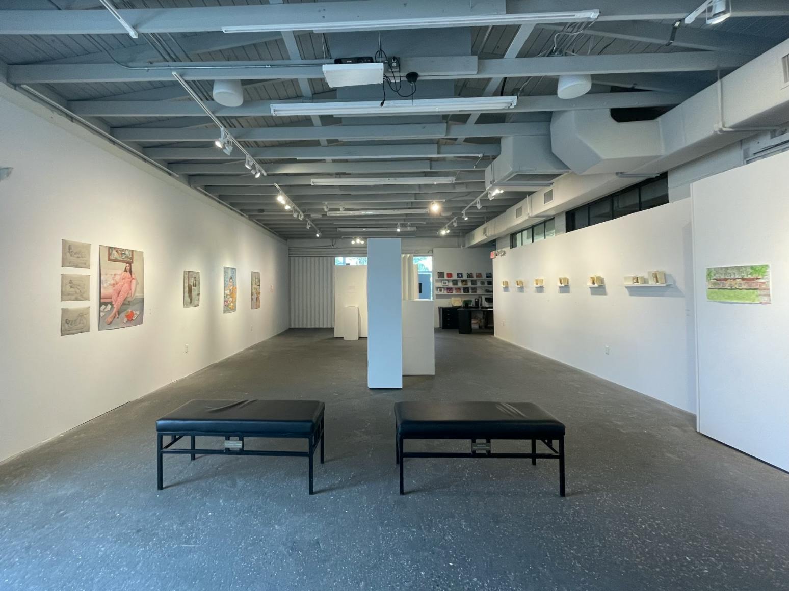 Both Lauren Mann’s (left) and Kerry Wilson's (right) art deals with themes of isolation, distance and loneliness. 