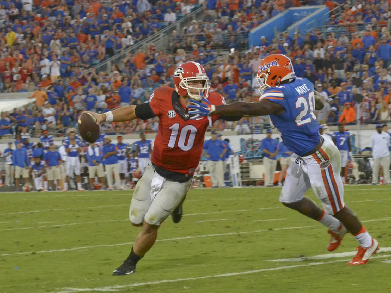 UF safety Marcus Maye attempts to tackle Georgia quarterback Faton Bauta (10) during Florida's 27-3 win against the Bulldogs on Oct. 31, 2015, at EverBank Field in Jacksonville.