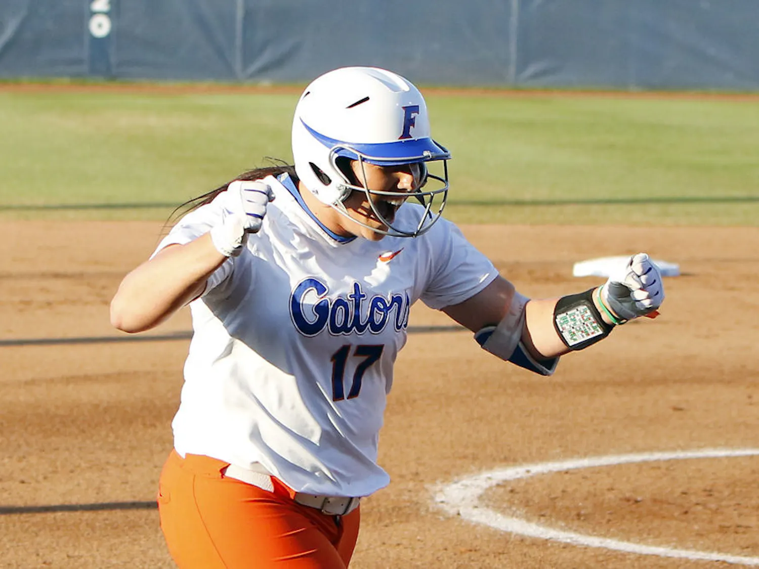 Florida's Lauren Haeger celebrates on the way home after hitting a home run in the first inning during the NCAA Women's College World Series Championship against Michigan in Oklahoma City, Monday.