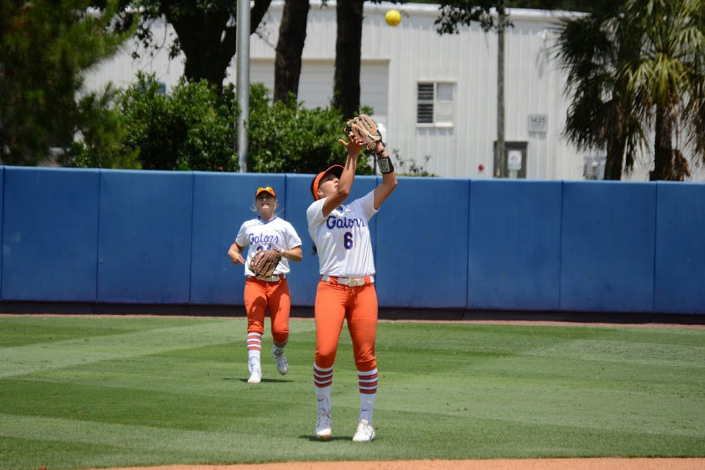 <p>UF shortstop Kathlyn Medina catches a pop out during Florida's 7-0 win against Kentucky on May 23 2015, at Katie Seashole Pressly Stadium.</p>