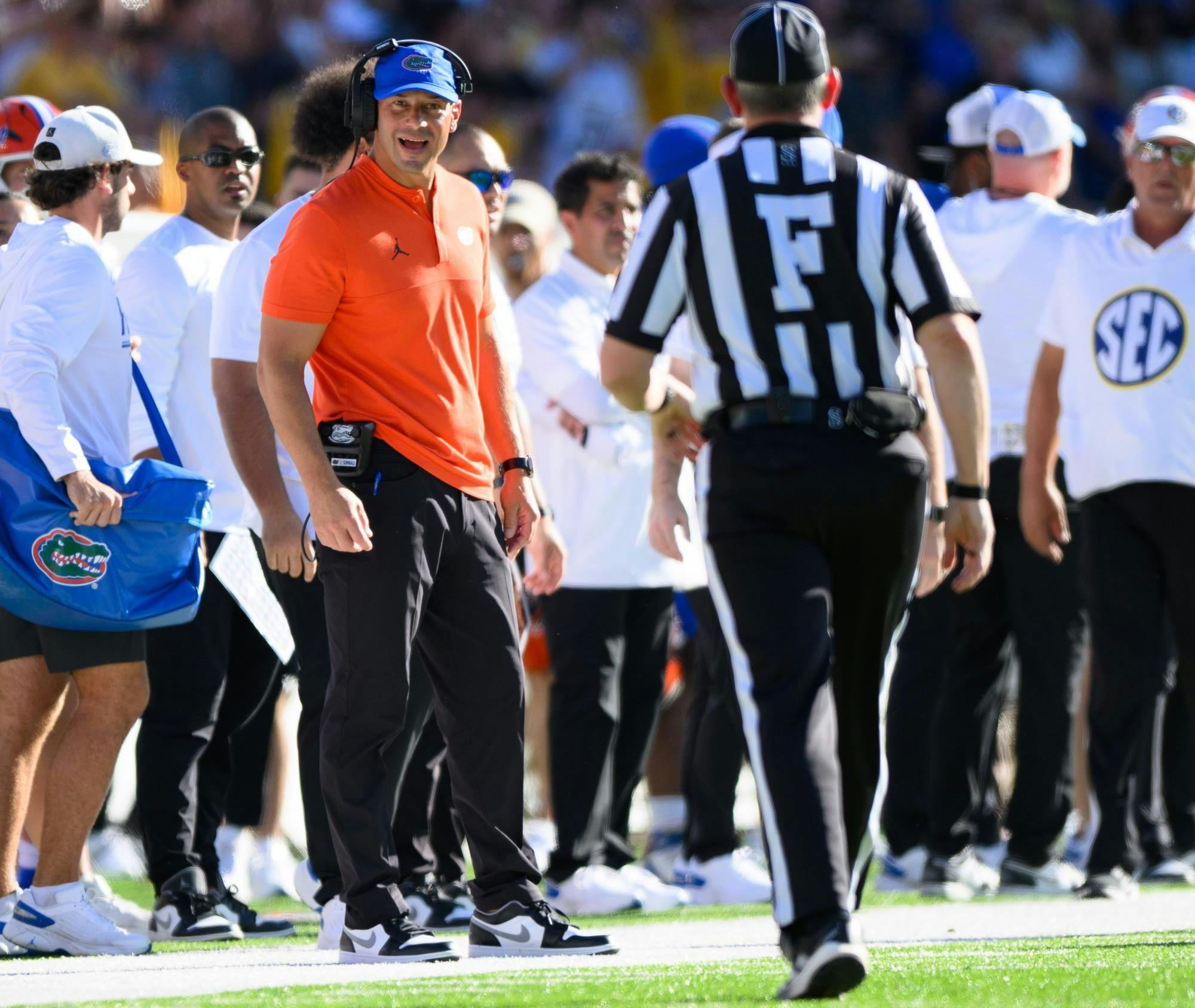 Florida head coach Jon Sumrall looks at a referee during the first half of an NCAA college football game against Missouri, Saturday, Oct. 3, 2026, in Columbia, Mo.