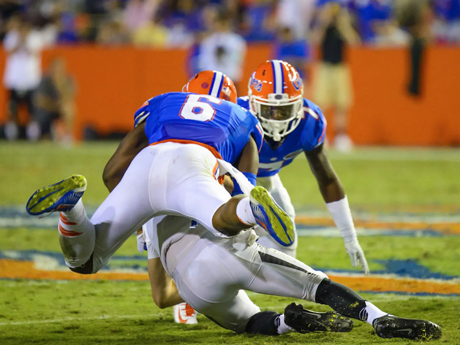 Dante Fowler Jr. (6) tackles Missouri quarterback Maty Mauk during Florida's 42-13 loss to Missouri.