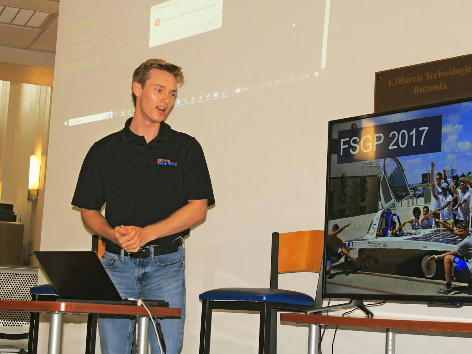 Christian Michaelis, former President of Solar Gators, gives a speech about the team’s history at UF&#x27;s New Engineering Building on Thursday, June 22, 2023.