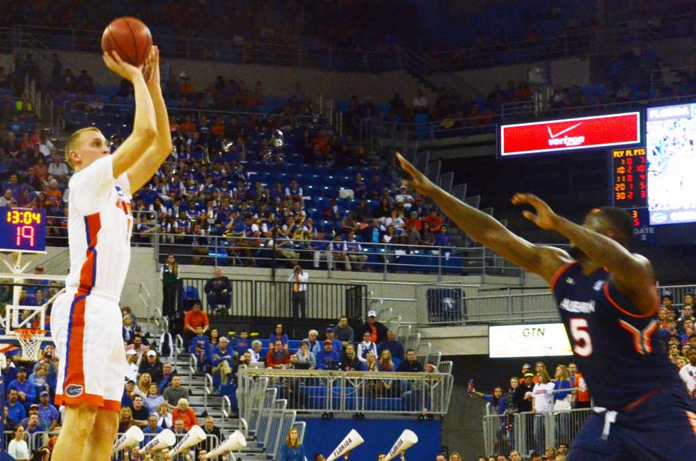 <p>Alex Murphy attempts a layup during Florida's win against Auburn on Thursday in the O'Connell Center.</p>