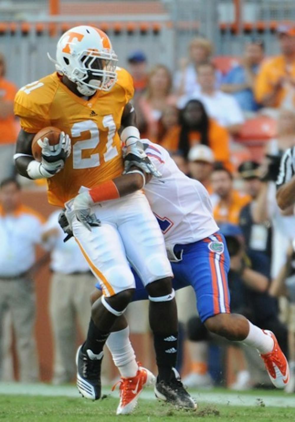 <p>Tennessee wide receiver Da’Rick Rogers (21) and teammate Justin Hunter have combined for more than 500 yards and five touchdowns this year.</p>