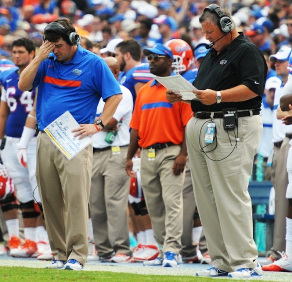 <p>Florida offensive coordinator Charlie Weis displayed frustration Tuesday with the progression of the offense. The unit committed several penalties against UT and struggled on third down.</p>