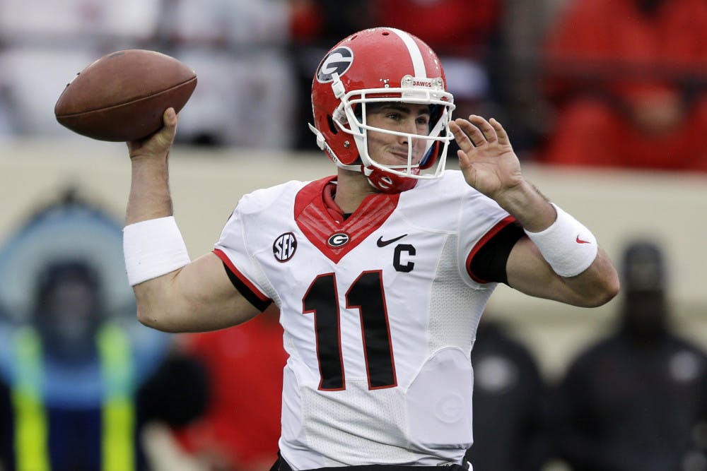 <p>Georgia quarterback Aaron Murray passes during a 31-27 loss against Vanderbilt on Oct. 19 in Nashville, Tenn.</p>