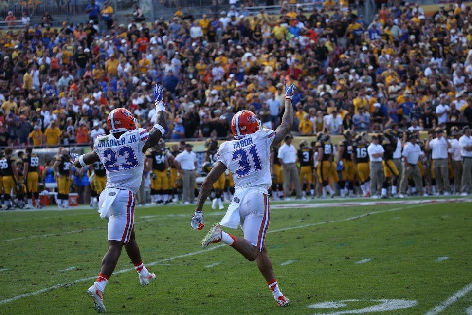 Florida defensive backs Chauncey Gardner and Jalen Tabor celebrate during UF's 30-3 Outback Bowl victory over Iowa on Monday, Jan. 2, at Raymond James Stadium.&nbsp;