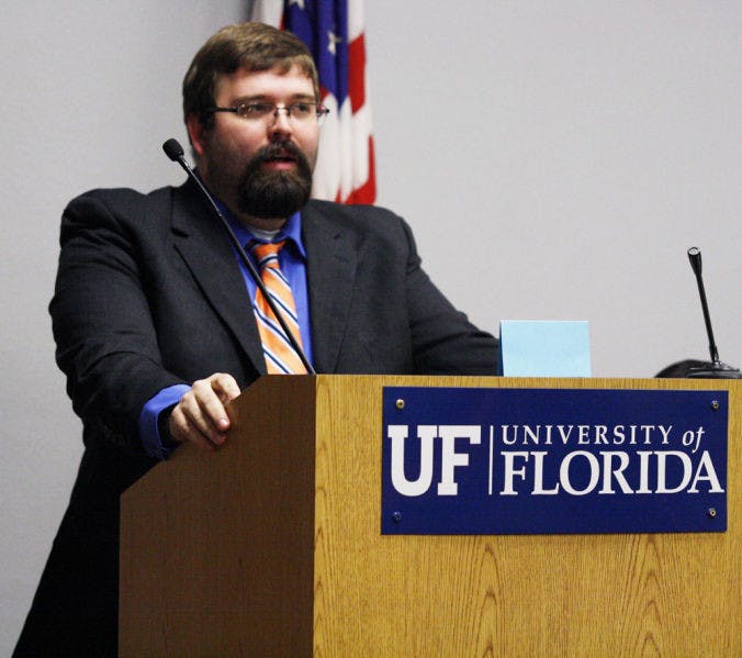 Student Sen. Morgan Vollrath expresses his discontent Tuesday at the Reitz Union after the Senate voted to table his election codes reform bill until next week.