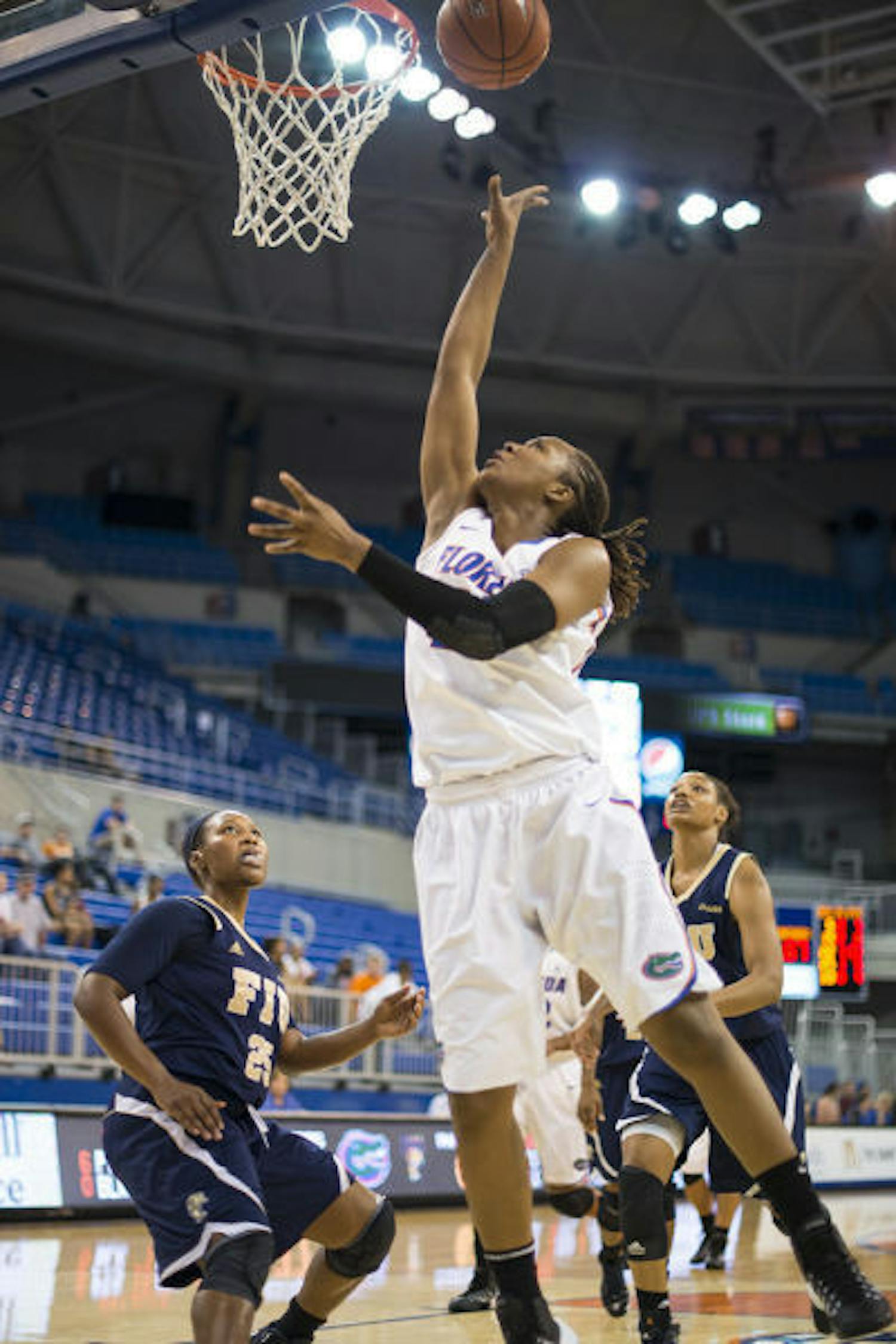 Sophomore Christin Mercer scores two of her career-high 31 points on a layup during Florida's 90-74 win over FIU on Dec. 21 at the O’Connell Center. The Gators claimed their fourth straight Gator Holiday Classic championship.