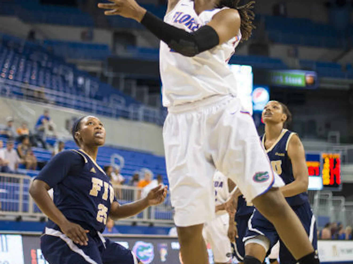 Sophomore Christin Mercer scores two of her career-high 31 points on a layup during Florida's 90-74 win over FIU on Dec. 21 at the O’Connell Center. The Gators claimed their fourth straight Gator Holiday Classic championship.