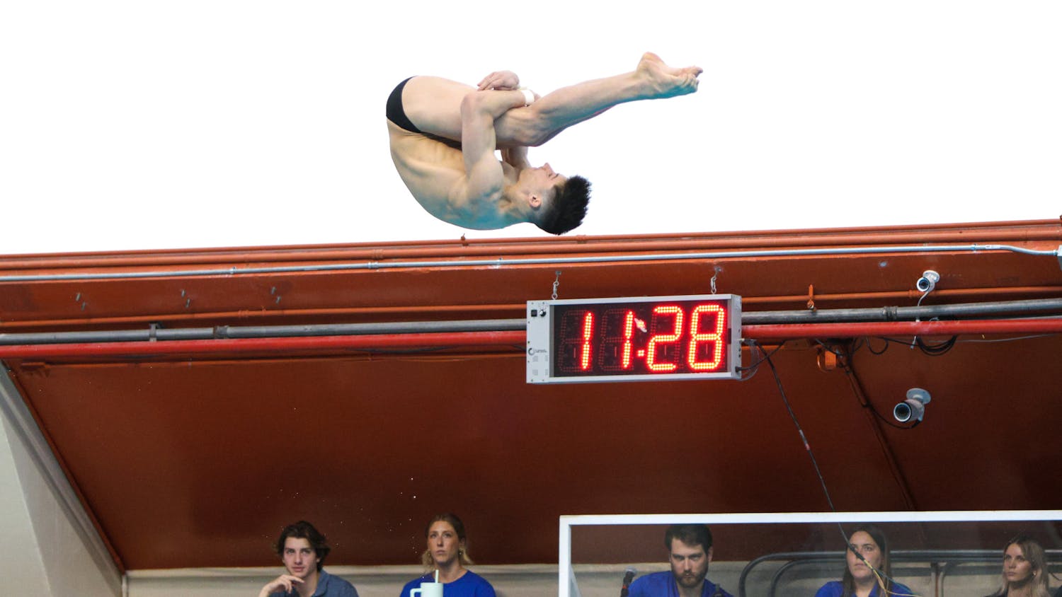 Senior Skip Donald performs in the men’s platform event in the men's and women's diving team meet Friday, January 27, 2024. 
