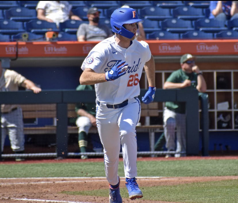 Outfielder Sterlin Thompson rounds the base path against Jacksonville March 14
