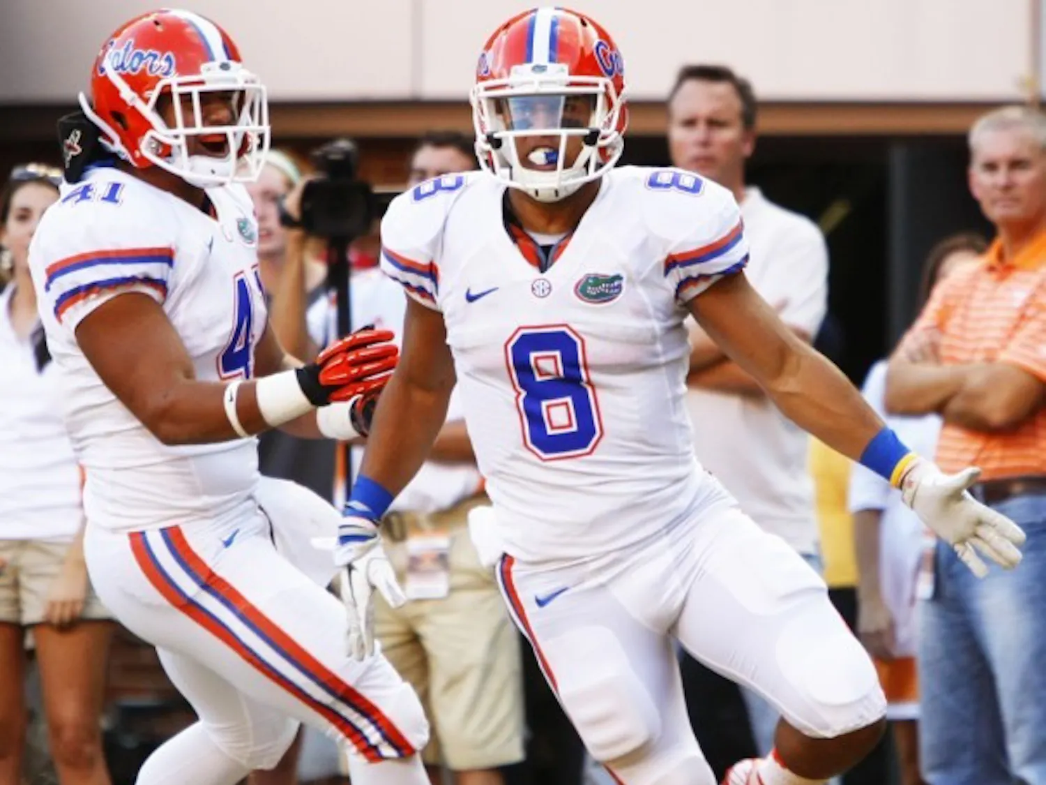 Running back Trey Burton (8) celebrates after scoring in his first trip to the red-zone at Neyland Stadium on Saturday.