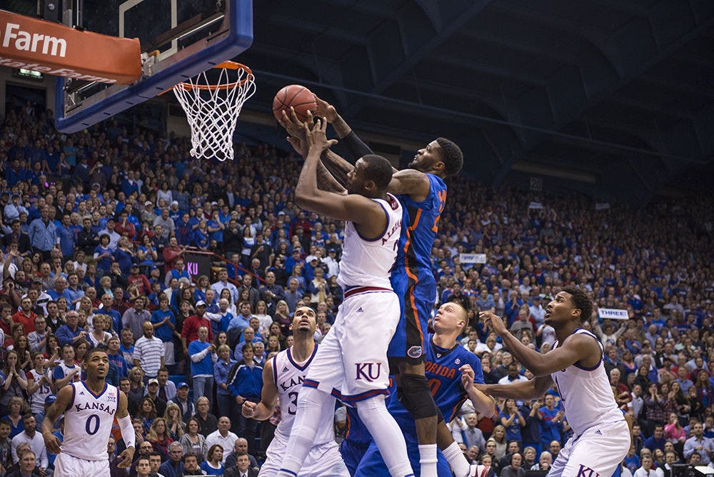 <p>Chris Walker attempts a layup during Florida's loss to No. 11 Kansas on Friday in Lawrence, Kansas.</p>