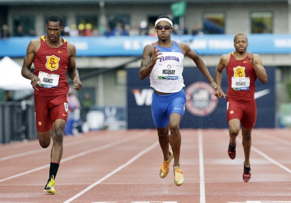 <p>Former Gator sprinter Tony McQuay (center) races against Josh Mance (left) and Joey Hughes Jr., in the men’s 400m semifinal at the U.S. Olympic Track and Field Trials on June 23. McQuay placed second in the finals with a personal record.</p>