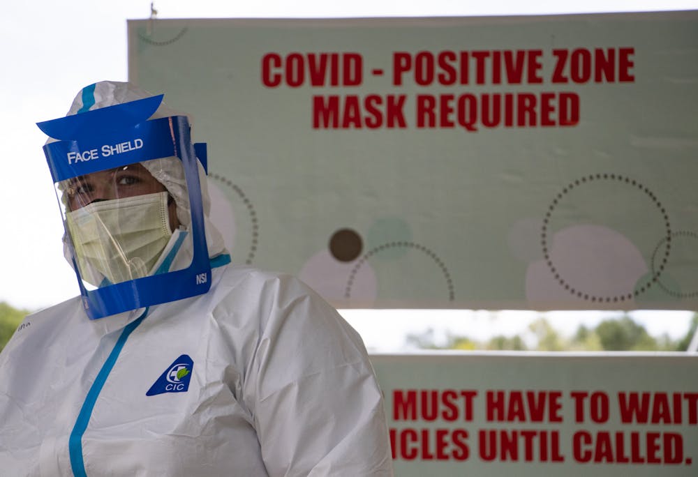 A worker is seen at the Alachua County monoclonal antibody site at the Fellowship Church in High Springs, Florida on Wednesday, Sept. 15, 2021. 