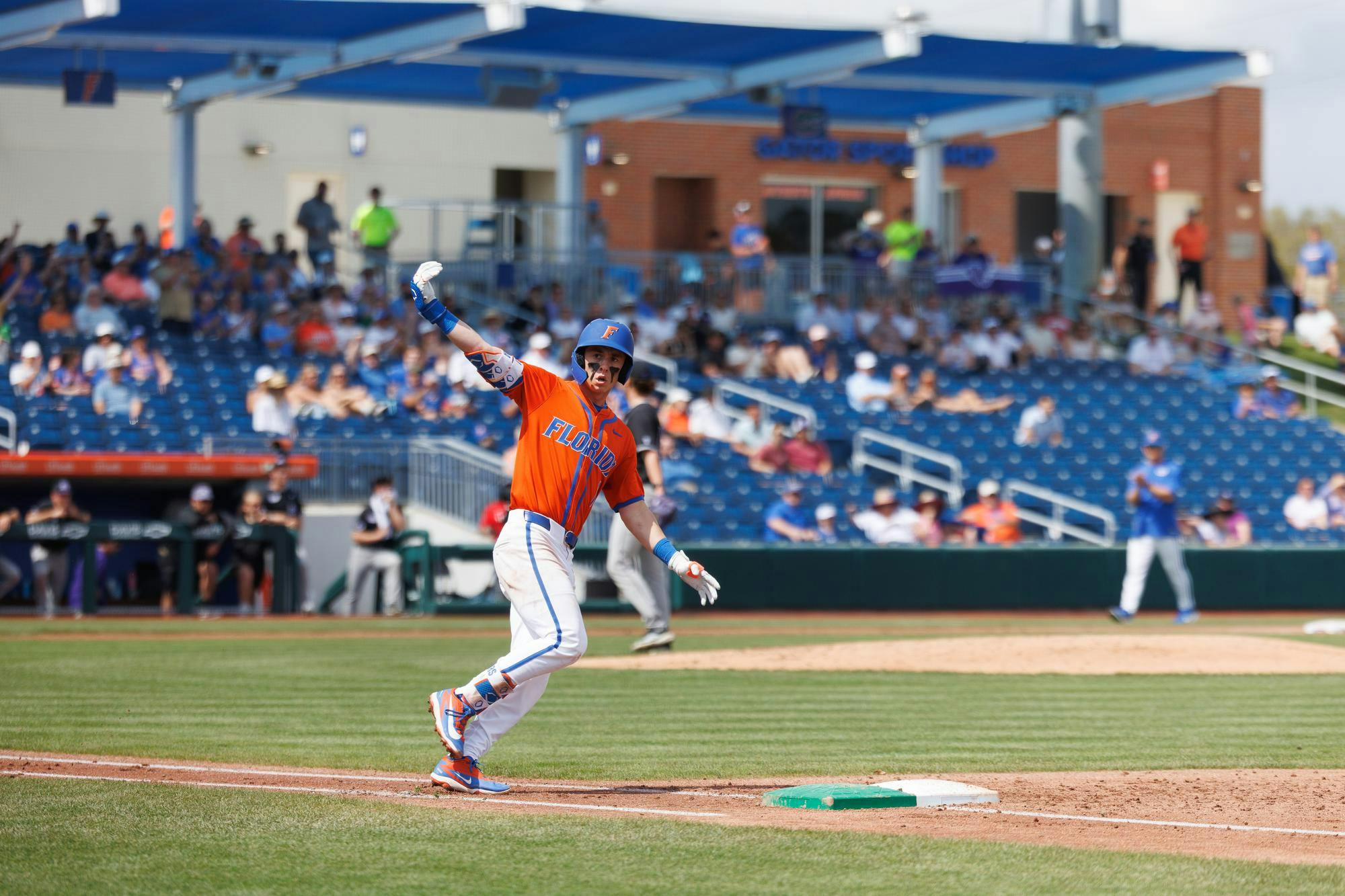 Florida infielder Justin Nadeau (1) celebrates hitting a home run during an NCAA baseball game against High Point University, Sunday, March 8, 2026, in Gainesville, Fla.