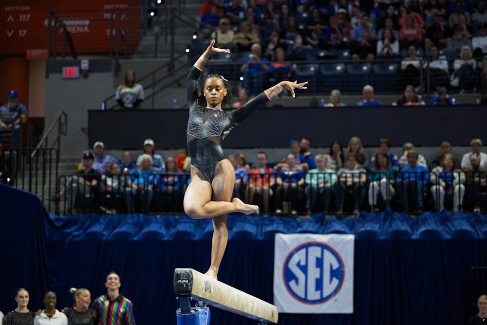 Florida Gators gymnast Selena Harris-Miranda performs on the balance beam in a gymnastics meet against the Missouri Tigers in Gainesville, Fla., on Friday, Feb. 28, 2025.