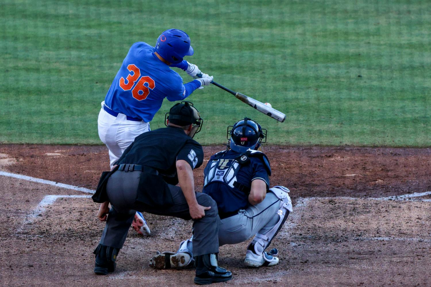 Florida left fielder Wyatt Langford hits the ball in the Gators' 16-2 win against the Charleston Southern Buccaneers Saturday, Feb. 18
