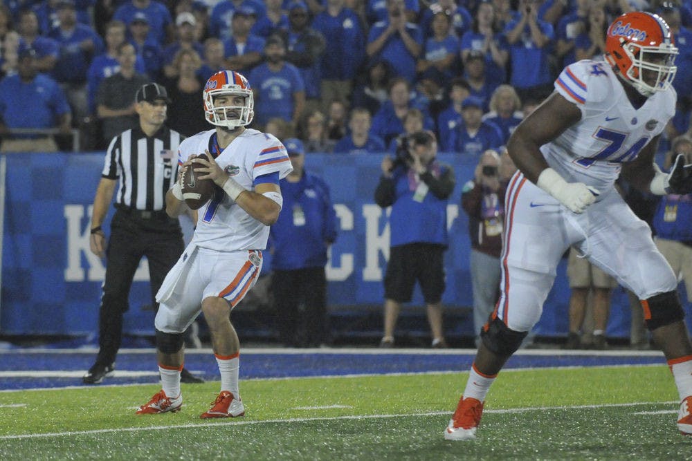 <p>UF quarterback Will Grier drops back to pass during Florida's 14-9 win against Kentucky on Sept. 19, 2015, at Commonwealth Stadium in Lexington, Kentucky</p>