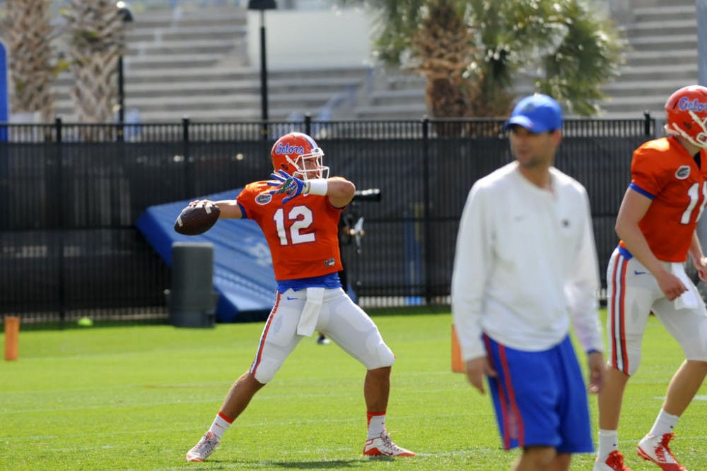 <p>Florida quarterback Austin Appleby throws a pass&nbsp;during a Spring practice on March 16, 2016, at the Sanders Practice Fields.&nbsp;</p>